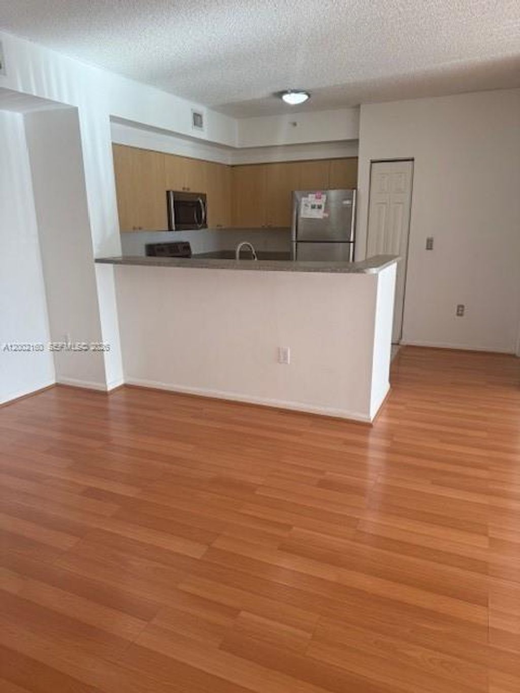 Photo of 8070 N Nob Hill Rd #205, Tamarac, FL 33321 (MLS # A12002160)