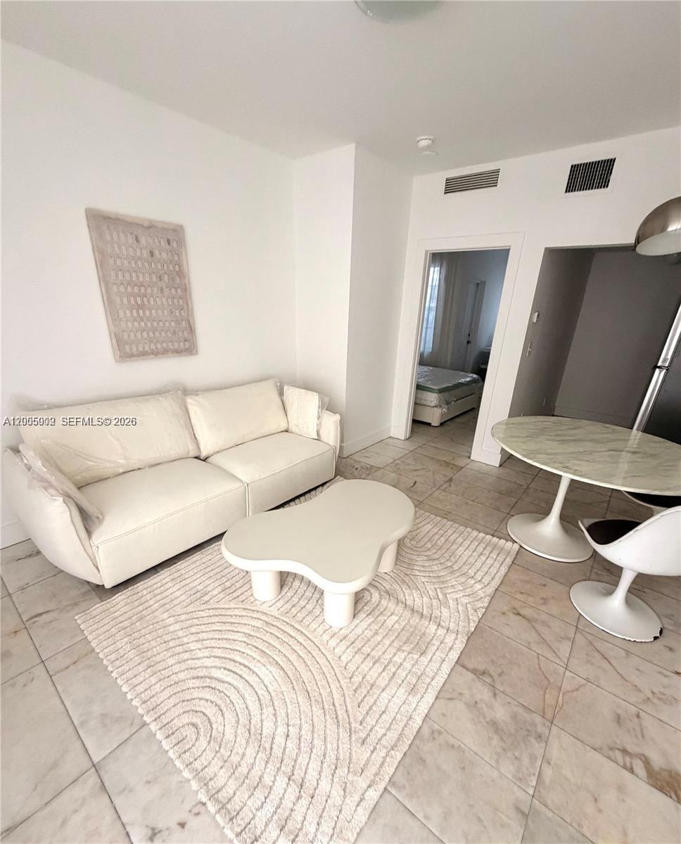 FIRST ON 8TH CONDO - Residential