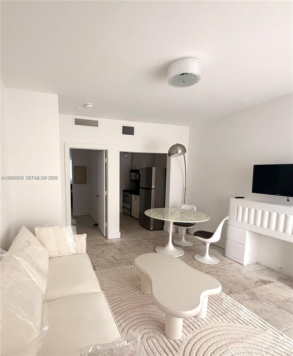 FIRST ON 8TH CONDO - Residential