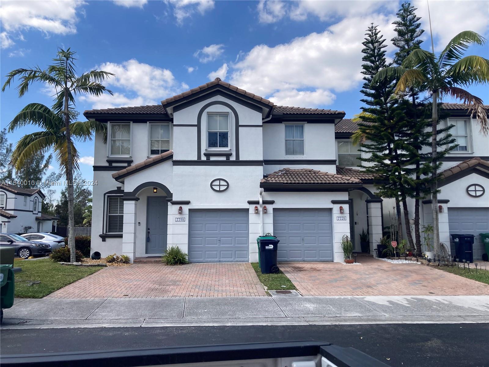 Big Renovate upgraded corner townhome. (The largest in the area) in a gated community in Doral. This townhouse has 4 bedrooms, 2 1/2 baths, 1 garage, and 2 parking in the driveway and plenty of visitor parking. stainless steel appliances, windows with Roman shade style, good size bedrooms and patio. Well-maintained private community featuring a pool (two pools), conveniently located from the shopping centers, next to Florida Turnpike, supermarkets, and public transportation in Doral. "READY TO MOVE " Actual Area 2,122 SF