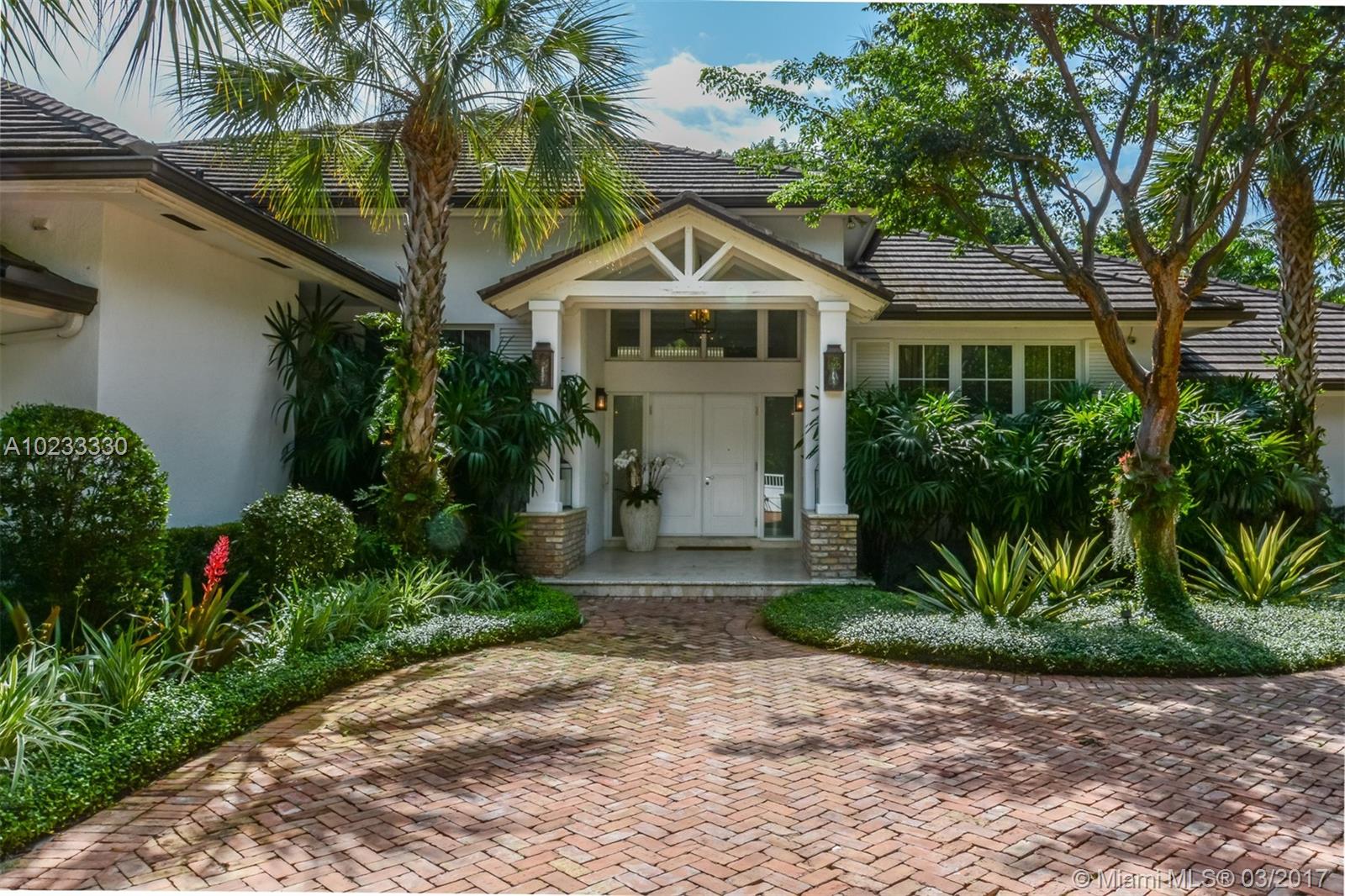 Tropical Florida architecture set on beautifully landscaped garden in exclusive Hammock Lakes gated community.  Main house has 5 bedrooms all en-suite, pool bathroom, plus guest bath.  Separate guest suite. &#xD;&#xA;Large living room with high coffered ceilings, formal dining room, large kitchen with top of the line appliances, breakfast room.  Family room with fireplace.   Exquisite architectural details throughout.  This home has been meticulously renovated and maintained. 24 hr notice to show.