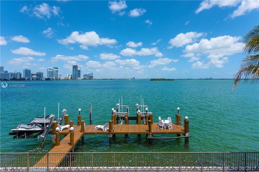 LOWEST PRICED 75’ WF HOME ON VENETIANS WITH OPEN BAY VIEWS! This beautiful 6BR/5BA home sits on Biscayne Bay & has breathtaking views of Miami Beach & Downtown! The master BR, located on the 2nd floor, has abundant natural light and direct bay views! The walk-in closet connects the BR to the master BA complete with a stunning claw foot tub. The kitchen features a large island, granite countertops, and a wine cooler. Bonus room upstairs.Backyard has a pool and spa, electric boat lift, and T-dock. Furnished