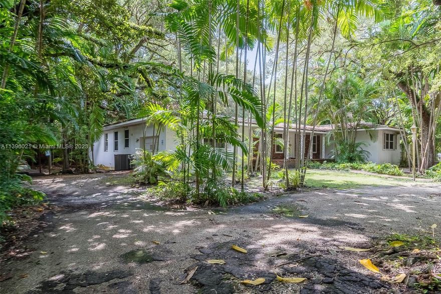 15,000 square feet of land with an elevation of 17 feet in South Grove to build or develop your dream home or project on. The property perimeter does contain a few mature Oaks mixed in with a few trees - invasive in nature – that can be removed without city approval. There is room for the Oaks to be trimmed back and manicured for that special canopy that will accentuate the new construction once complete. This corner lot is rectangular in shape and conducive to a “left to right” build. The current structure is a 3/2 pool home at 2343 square feet built back in 1950. A new survey as of June 6th has been completed. All offers welcomed!!