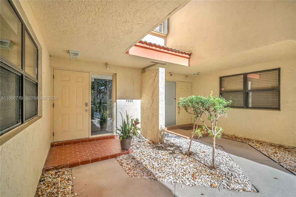 Photo of 3405 Emerald Oaks Dr #207, Hollywood, FL 33021 (MLS # A11956719)