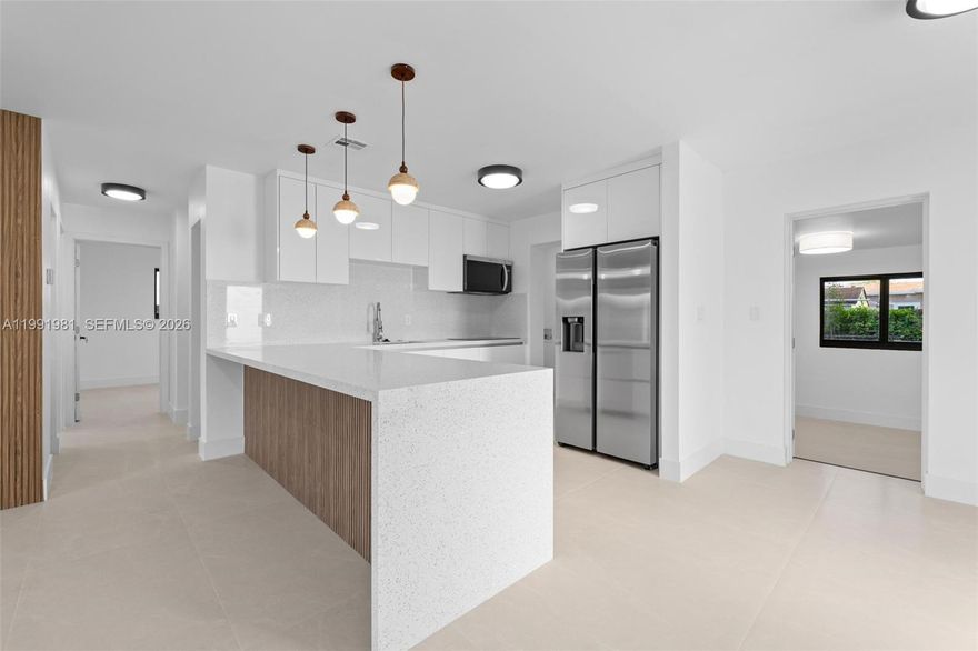 Beautiful, newly remodeled home in Miramar! 

Key Features:

3 spacious bedrooms
2 modern bathrooms
Fully renovated kitchen with a peninsula
Living and dining areas with excellent natural lighting

Recent Upgrades:

Impact windows (for protection and energy efficiency)
Complete renovation—move-in ready!

Exterior:

Spacious yard—ideal for family gatherings or future enhancements
Parking space available

Perfect for buyers seeking comfort, security, and a home that is ready to move into. 

Don't miss this opportunity! Contact us today for more information or to schedule a viewing.