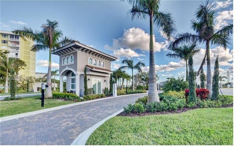 Stunning 3BR/2.5BA Raritan Model by Pulte Homes with numerous high-end upgrades and modern touches! Enjoy sunsets from your screened-in lanai overlooking the lake. Features include 8’ doors, crown molding, impact windows, upgraded tile, carpet, Oversized laundry room offering flexibility for a home office, craft corner, or children’s playroom, Sherwin Williams grey paint, new ceiling fans & blinds. Smart home ready with Vivint security, video doorbell, smart locks & thermostat. Located in gated Parkview at Hillcrest, offering a 70-acre park, clubhouse, resort-style pool, fitness center, tennis, playground & walking trails. Minutes to Hollywood Beach, Ft. Lauderdale Airport, dining & entertainment.Commercial vehicle parking is also available. Modern living at its best!