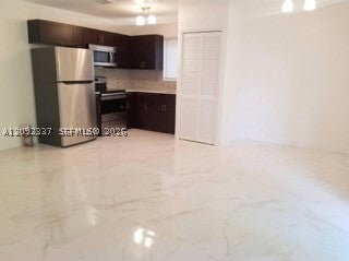 Photo of 5641 NW 15th St #2, Lauderhill, FL 33313 (MLS # A12092337)
