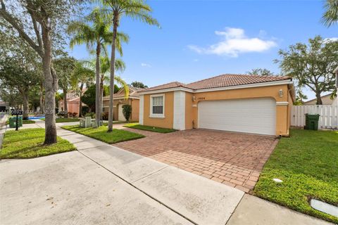 Photo of 15624 NW 12th Rd, Pembroke Pines, FL 33028 (MLS # A11908927)