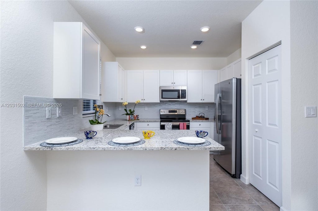 Photo of 6502 S Anise Ct, Davie, FL 33314 (MLS # A12031502)
