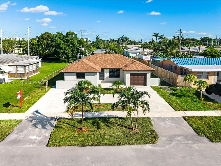 Rebuilt from the ground up in 2025, this stunning home offers a spacious open-concept layout with one car garage, and elegant porcelain floors and modern finishes throughout. The kitchen features contemporary cabinetry, quartz countertops, and sleek design details. It includes 3 bedrooms and 2.5 bathrooms, beautifully updated with stylish bathrooms and premium fixtures. The circular driveway and landscaped front yard create a welcoming entrance, while the expansive backyard provides endless possibilities for outdoor living or entertainment. Central A/C, impact windows, and move-in ready condition. Conveniently located in the heart of Dania Beach, east of US-1 — just 5 minutes from the beach, airport, shopping, casinos, and a vibrant mix of dining and cultural attractions.