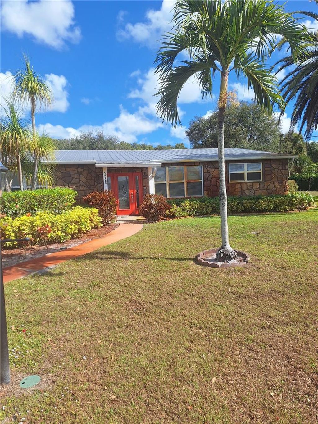 Photo of 5525 SE Ault Ave, Stuart, FL 34997 (MLS # A11985692)