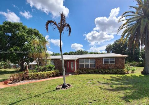 Photo of 5525 SE Ault Ave, Stuart, FL 34997 (MLS # A11985692)