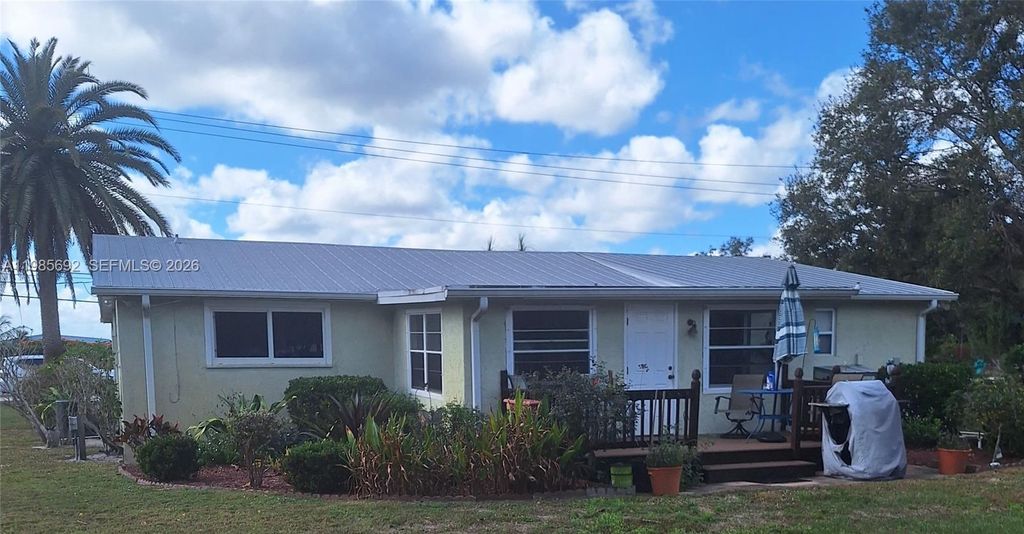 Photo of 5525 SE Ault Ave, Stuart, FL 34997 (MLS # A11985692)