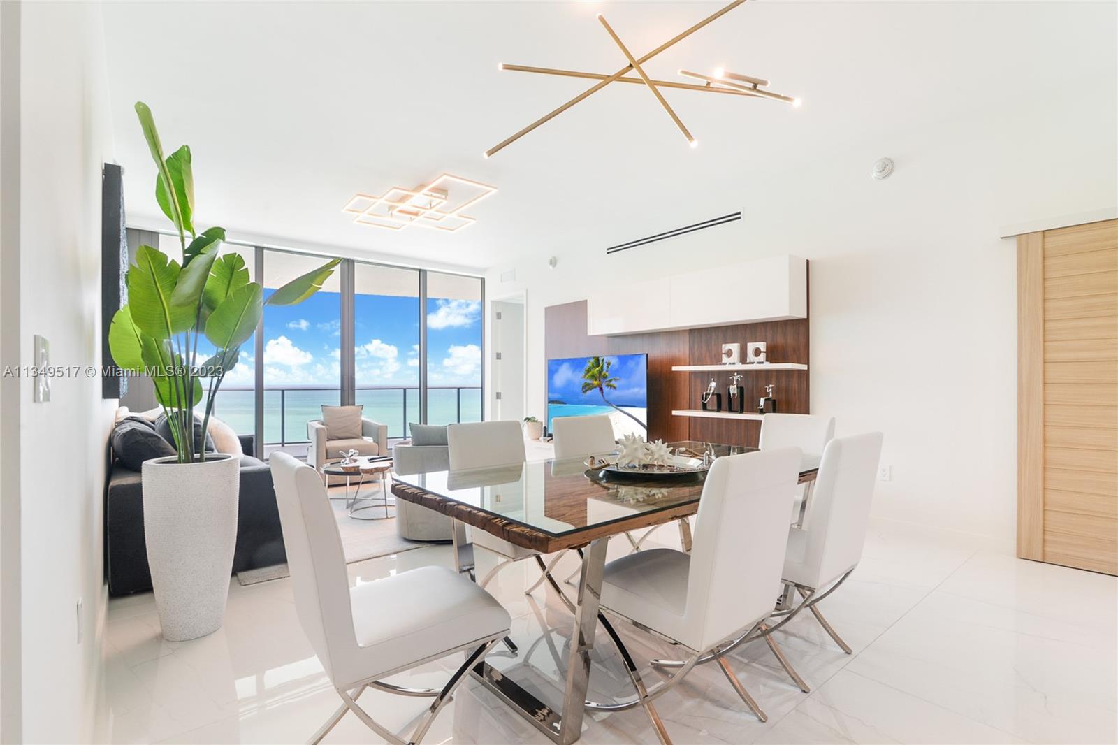 Spectacular “tun key” fully furnished residence in The Ritz-Carlton in Sunny Isles Beach. Direct ocean views from all of the bedrooms and a large terrace. 2 Beds plus Den + 2.5 Baths. Private elevator foyer. Gaggenau kitchen appliances, Quartz countertops, and imported Italian cabinetry. Unsurpassed amenities include concierge, valet, beach bar and grill restaurant, beach & pool services, 2 swimming pools, 2 hot tub, oceanfront gym and spa, wine lounge, game room, and daily complimentary continental breakfast.
