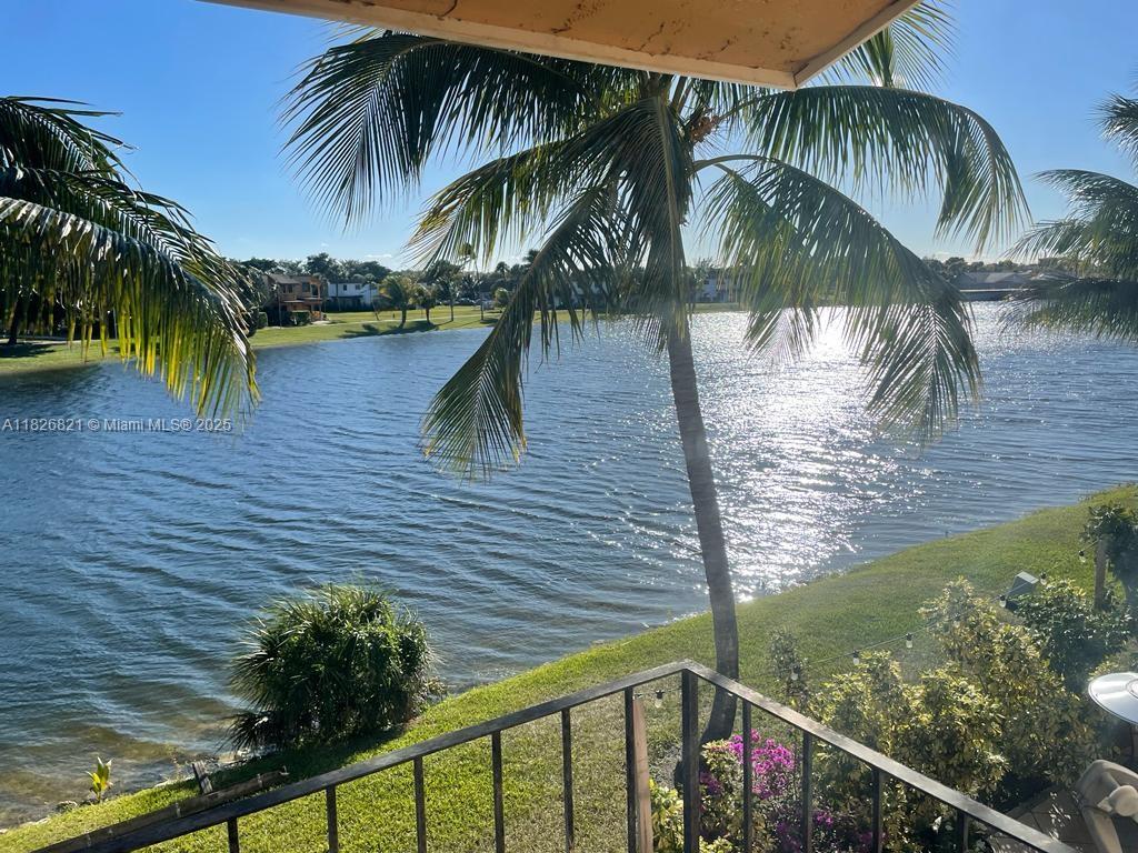 Beautiful lake front condo located in the charming Tropical Laguna Community. With 3 bedrooms and 2 newly renovated bathrooms, this bright and airy unit features an open floor plan connecting living room and dining room perfect for entertaining. Step out onto your private balcony and take in the serene view of the lake. Located just minutes from great schools, shops, dining, and major roadways, this condo offers the perfect blend of comfort and convenience.