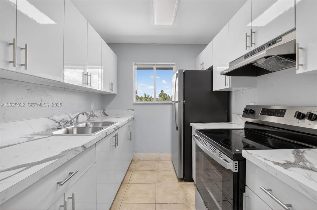 Photo of 2103 Catherine Dr #2, Delray Beach, FL 33445 (MLS # A12025022)