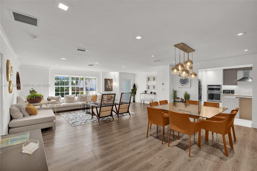 Welcome home to this beautifully renovated 4-bedroom, 3.1-bath residence situated on a desirable corner lot in the charming Enchanted Lakes community, just next to Aventura and only minutes from the beach and major airports. This home showcases high-end contemporary upgrades throughout, including wood and travertine flooring, a gourmet chef’s kitchen, and fully updated bathrooms. Beyond the aesthetics, the home has been thoughtfully improved with major system upgrades such as a new AC, electrical system, appliances, and sprinkler system. Currently configured as a 3-bedroom layout, it offers both comfort and functionality. Step outside to enjoy your own private retreat featuring a heated pool and jacuzzi surrounded by lush tropical coconut trees. Additional highlights include a spacious two-car garage and an impressive circular driveway, all located on a peaceful, tree-lined street.