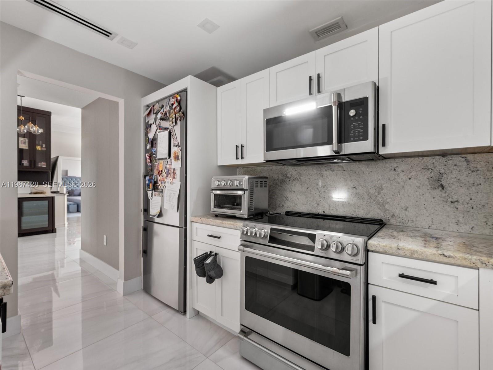 GABLES PLAZA CONDO - Residential Lease