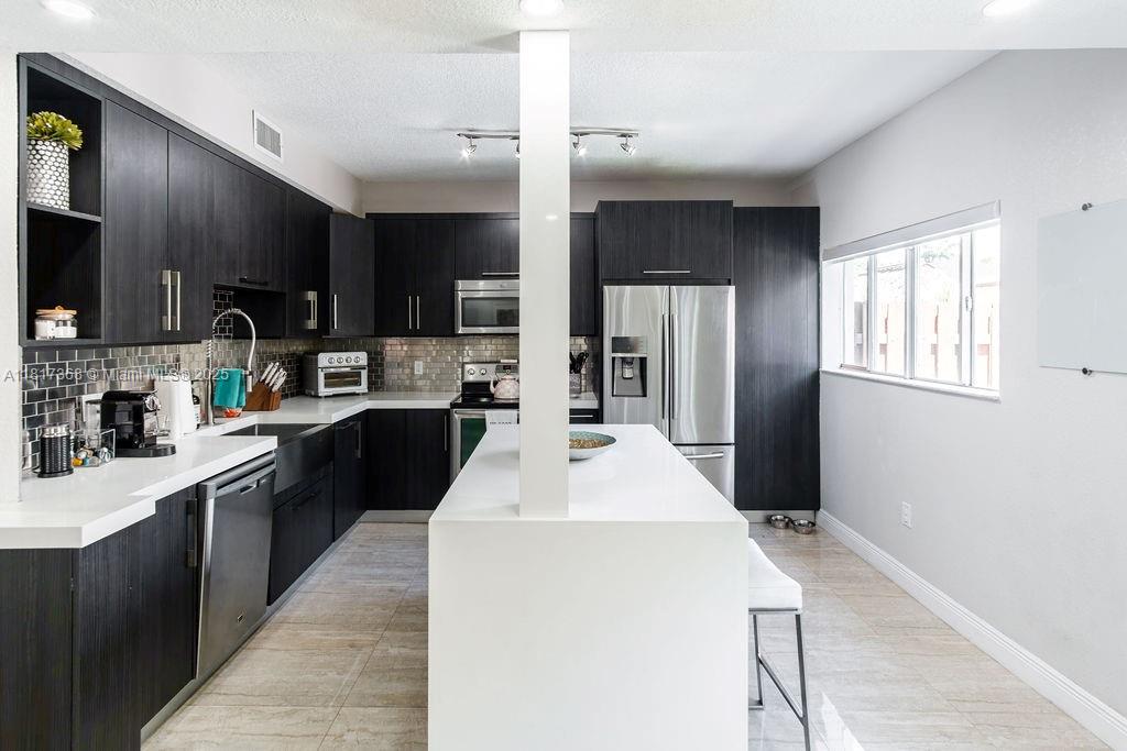 KENDALL VILLAGE TOWNVILLA - Residential