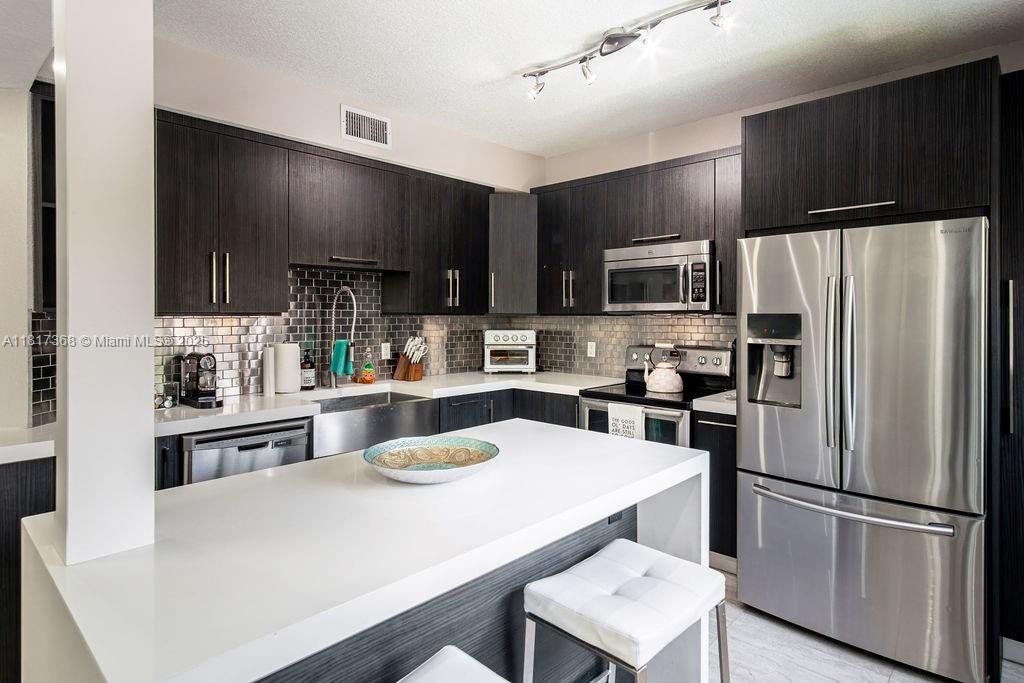 KENDALL VILLAGE TOWNVILLA - Residential