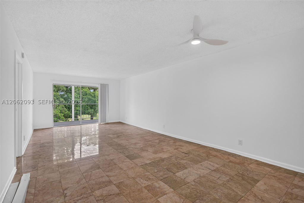 Photo of 6080 NW 44th St #410, Lauderhill, FL 33319 (MLS # A12062093)