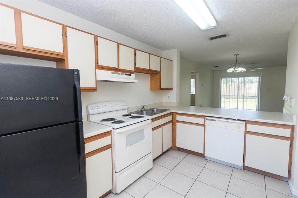 Photo of 2157 SW 80th Ter #2157, Miramar, FL 33025 (MLS # A11987533)
