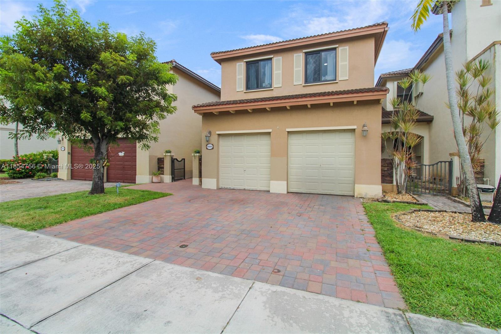 Stunning 3BR + Den / 2.5BA in Isles of Bayshore–No Rear Neighbors! Fully upgraded and move-in ready, this gem has an additional den and is located in sought-after Isles of Bayshore. Enjoy true privacy with no neighbors behind and a spacious terrace ideal for entertaining. Interior highlights include sleek porcelain tile flooring throughout, a chef’s kitchen with real wood cabinetry, quartz countertops, and high-end stainless-steel appliances. Bathrooms have been tastefully remodeled with modern, upscale finishes. The versatile den offers the perfect space for a home office, playroom, or guest room. Top of the line High Impact Windows and Doors. Low HOA and access to resort-style amenities including clubhouse, pool, gym, and more. A rare blend of style, space, and value in a prime location.