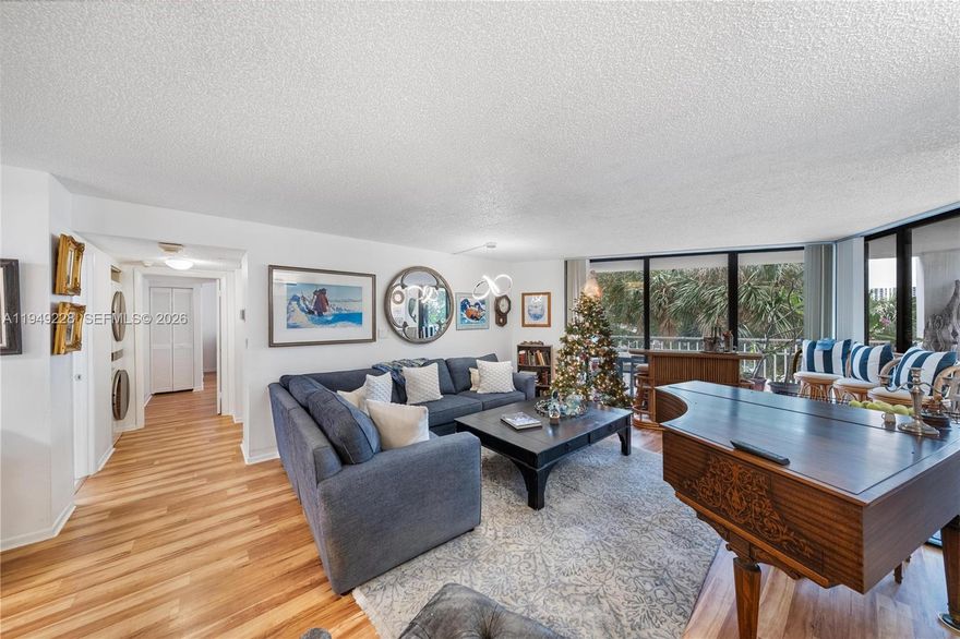 Spacious low-floor corner unit with 2 bedrooms and 2 bathrooms, offering the potential to convert into a 3-bedroom layout. Set at tree level with lush mature landscaping, providing exceptional privacy and a serene setting. Bright and open floor plan with generous living areas. Located in a waterfront building within the gated The Towers of Quayside, a hidden gem on 34 acres of bayfront grounds. Resort-style amenities include tennis courts, private restaurant, marina, full spa with daily classes, sauna, steam, cold plunge, basketball court, children’s playground, and 24-hour security. All amenities included in the monthly maintenance. This is not just a home—it’s an investment in a lifestyle unlike anything else in Miami.