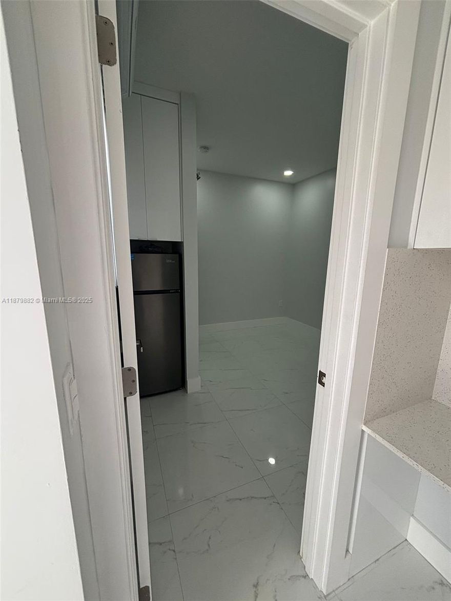 Modern studio featuring sleek finishes, porcelain tile flooring and a fully equipped kitchenette with gass shower, generous closet storage, and efficient layout. Bright, clean and move-in ready. Perfect for comfortable living in a clean, comtemporary setting. Conveniently located just minutes from Florida's Turnpike exit 5. Very easy access!!
