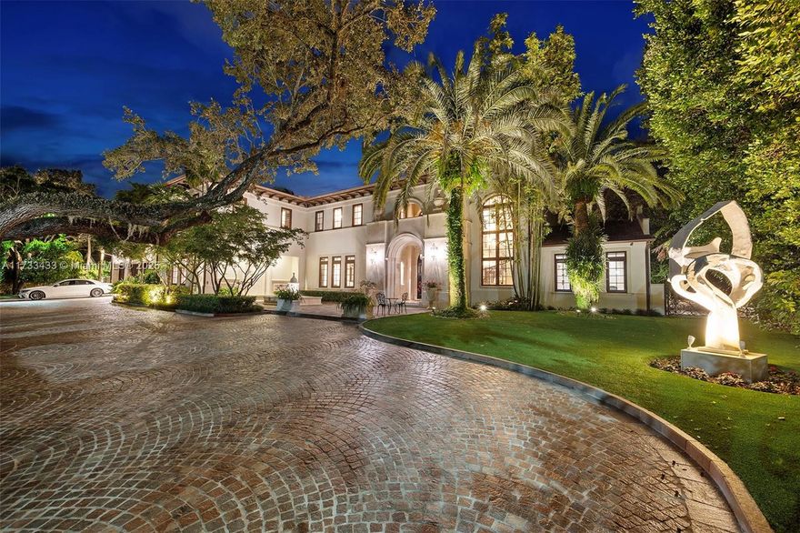 Nestled in prestigious Ponce Davis, 4800 Pine Drive is an experience of unparalleled elegance & sophistication. This exquisite estate has been thoughtfully designed for those who seek perfection & privacy. Every detail of the 12,712 SF home reflects a meticulous attention to quality. The heart of the home is its bespoke kitchen, where Wolf, SubZero, & Miele appliances stand ready for culinary creations.A centerpiece island with bar seating is perfect for casual gatherings, while the adjacent catering kitchen in the pool house supports upscale entertaining. The 8 bedroom residence includes a master wing with a spa-like bathroom,soaking tub & steam shower. A commercial elevator seamlessly connects the 2 levels, while Control4 Smart Home automation offers the pinnacle of modern convenience.