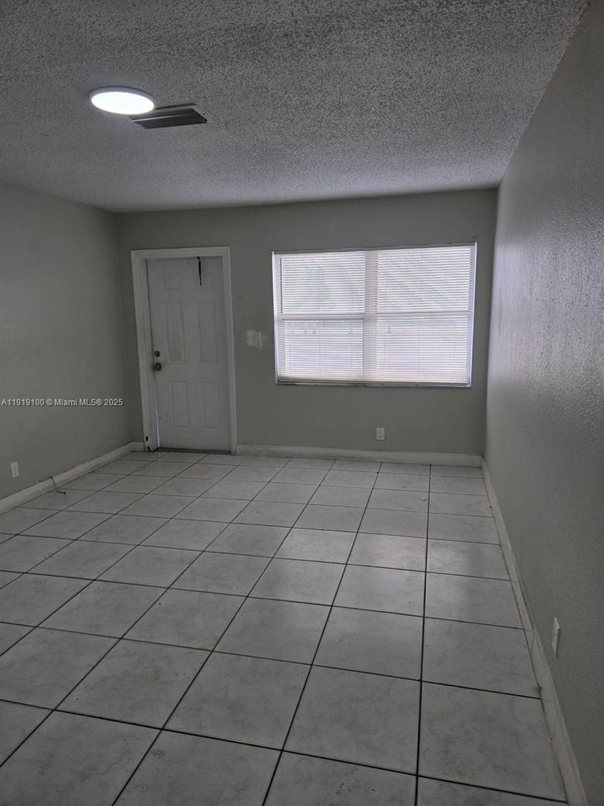 Beautiful and spacious 2-bedroom, 1-bath unit in a well-maintained multifamily building in Lauderdale Lakes. Bright, freshly painted, and move-in ready. Features tile flooring throughout, an updated kitchen, ample living area, and excellent natural light. On-site parking. Great location close to major roads, shopping, and public transportation. Easy to show!