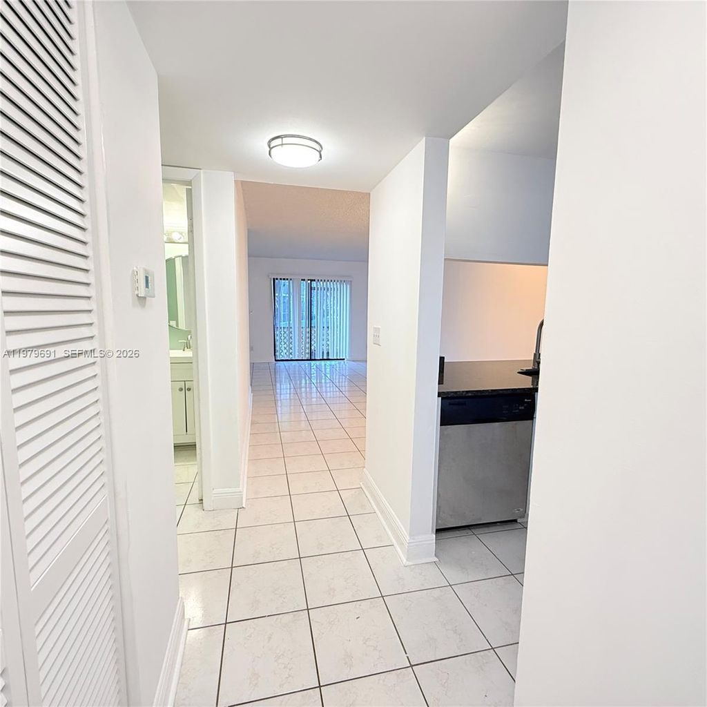 Photo of 10541 NW 10th St #103, Pembroke Pines, FL 33026 (MLS # A11979691)