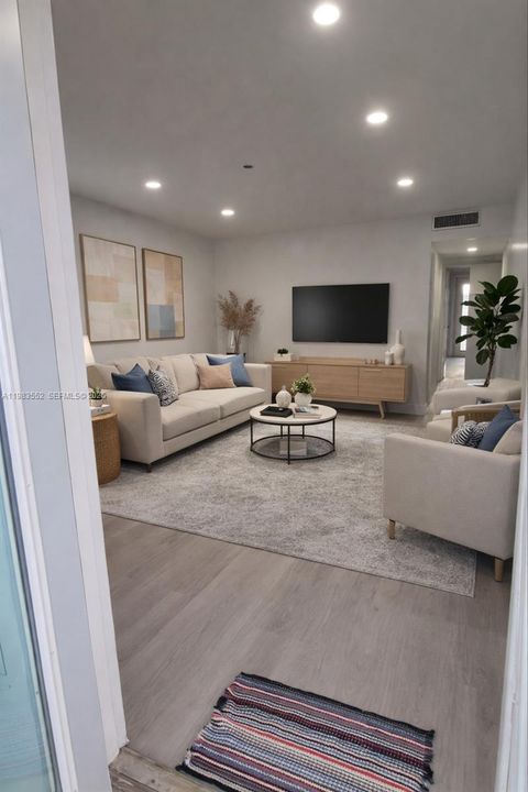 Photo of 455 Golden Isles Dr #310, Hallandale Beach, FL 33009 (MLS # A11983552)