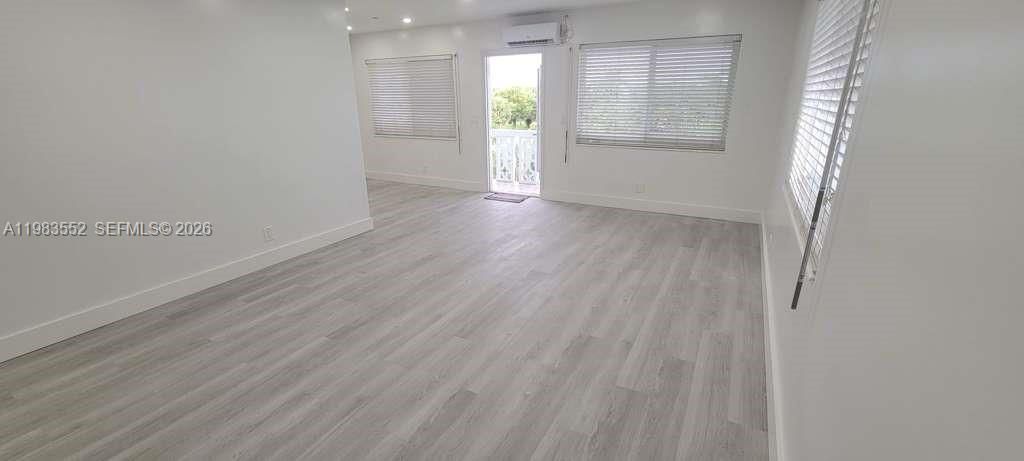 Photo of 455 Golden Isles Dr #310, Hallandale Beach, FL 33009 (MLS # A11983552)