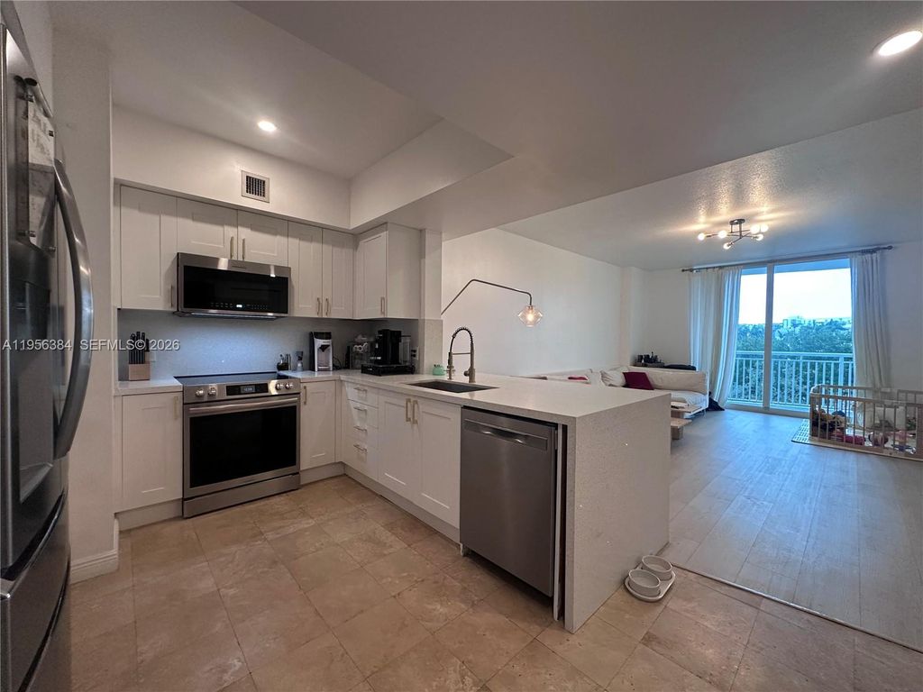 Photo of 1755 E Hallandale Beach Blvd #304E, Hallandale Beach, FL 33009 (MLS # A11956384)