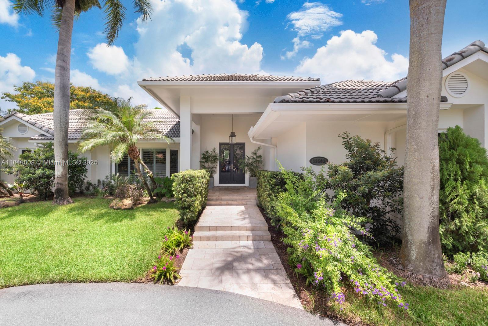 Beautifully remodeled 1 story pool home in sought-after Pine Bay Estates, Palmetto Bay. This spacious 5-bed, 5.5-bath triple-split-plan home offers comfort and functionality. The garage has been thoughtfully converted into a versatile extra room, with additional storage and a dedicated laundry area, bringing the total interior space to approximately 3,938 sq ft (per owner). Features include tile floors, impact windows/doors, Thermador appliances, KitchenAid fridge, Carrara marble counters, and a whole-house dichlorination system. The expansive primary suite offers privacy and luxury. Set on a lush ½-acre lot with mature landscaping, a serene pool, covered patio, and half basketball court, ideal for entertaining. Rare opportunity in one of Palmetto Bay’s premier neighborhoods.