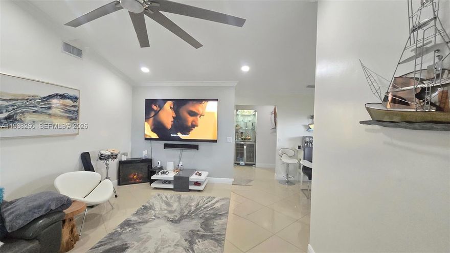 Exceptional 3-bedroom, 2-bathroom corner lot home. Unique style and function. From the moment you arrive, professionally landscaped, private backyard—with its maintenance-free artificial turf
and custom wall bar—invites you to relax and unwind. Inside, thoughtful upgrades abound, including custom 4-panel doors. Both bathrooms have been completely remodeled, and every room features a custom-designed closet, new roof in 2025, accordion shutters and a great deal of additional upgrades. Come see it!