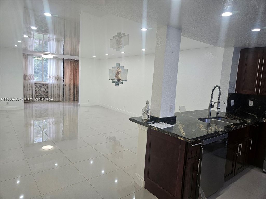 Photo of 301 NE 14th Ave #207, Hallandale Beach, FL 33009 (MLS # A11560493)