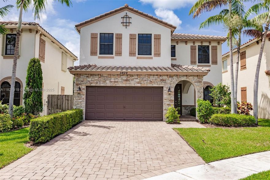 Beautiful 2-story home featuring a striking brick-accented front, shuttered exterior windows, and a driveway with elegant pavers. The front yard landscaped with grass & manicured shrubs while the backyard  offers a blank canvas to design your dream outdoor living space. Step inside to tile floors downstairs and lvp floor on the stairs and upstairs living areas.  Neutral paint color throughout that complements any decor. Upon entry, you'll find a formal living room perfect for entertaining. The open-concept family room flows seamlessly into the kitchen, featuring  an island & stainless steel appliances. All bedrooms are upstairs, have ceilings fans, raised panel doors and are good sized! Thanks for showing this gorgeous home!