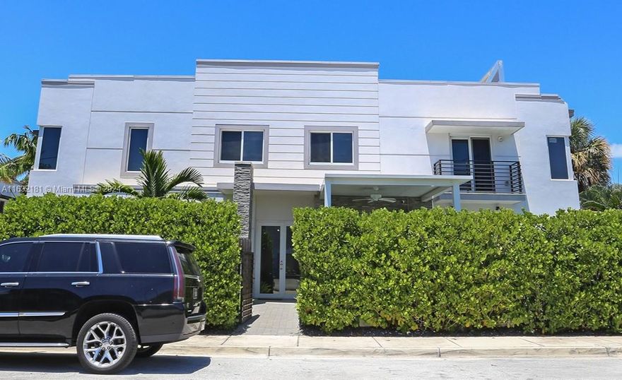 LOCATION! LOCATION! Turn Key & MOVE IN READY! Spectacular, modern, 3 Bed/2.5 Bath townhouse in Victoria Park!! 2021 Construction, End unit with fenced in Private Heated Pool, Hot Tub and Covered Outdoor Lounge/TV area! Beautiful tile downstairs & wood-like waterproof flooring on stairs, upstairs hallways & in all bedrooms. 9 Foot Ceilings! Italian-style kitchen cabinets, Quartz Countertops w/Stainless Steel Appliances. Custom built-in bar/cabinets w/2 Beverage Coolers! Large Primary Suite w/2 walk-in closets & Balcony overlooking pool.  Primary bath boasts a double vanity, high-wall tub & separate large shower. Hurricane Windows & Doors throughout, Epoxy Garage Floor, Motorized Sheer Light Filtering Zebra Shades! Minutes from Ft. Lauderdale Beach, Downtown, & Las Olas! Quick HOA Approval!