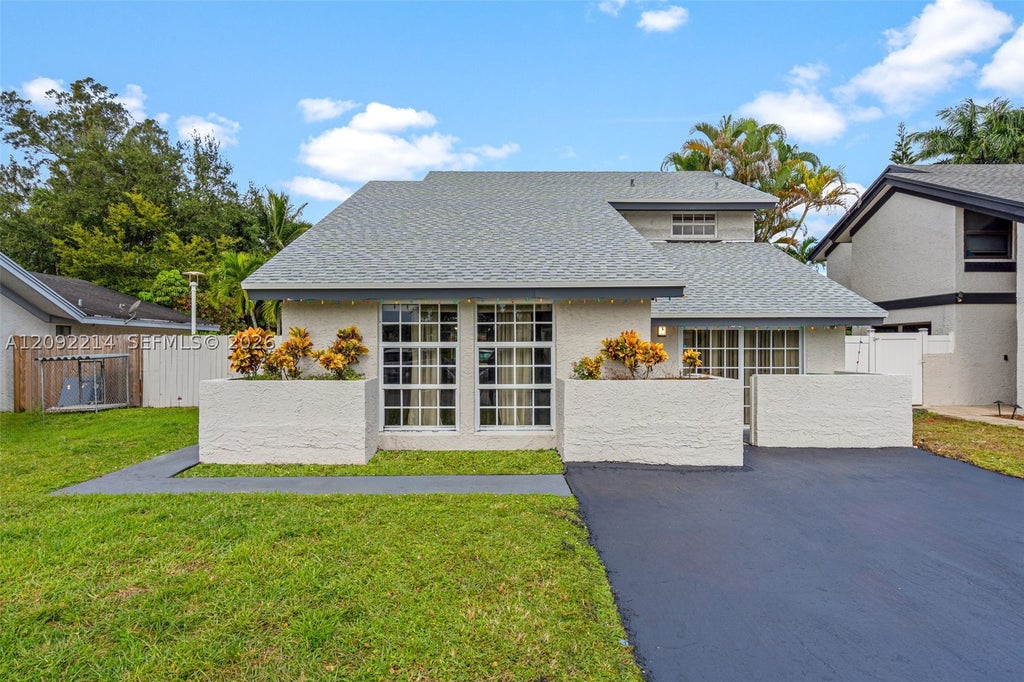 Photo of 8351 SW 39th Ct, Davie, FL 33328 (MLS # A12092214)