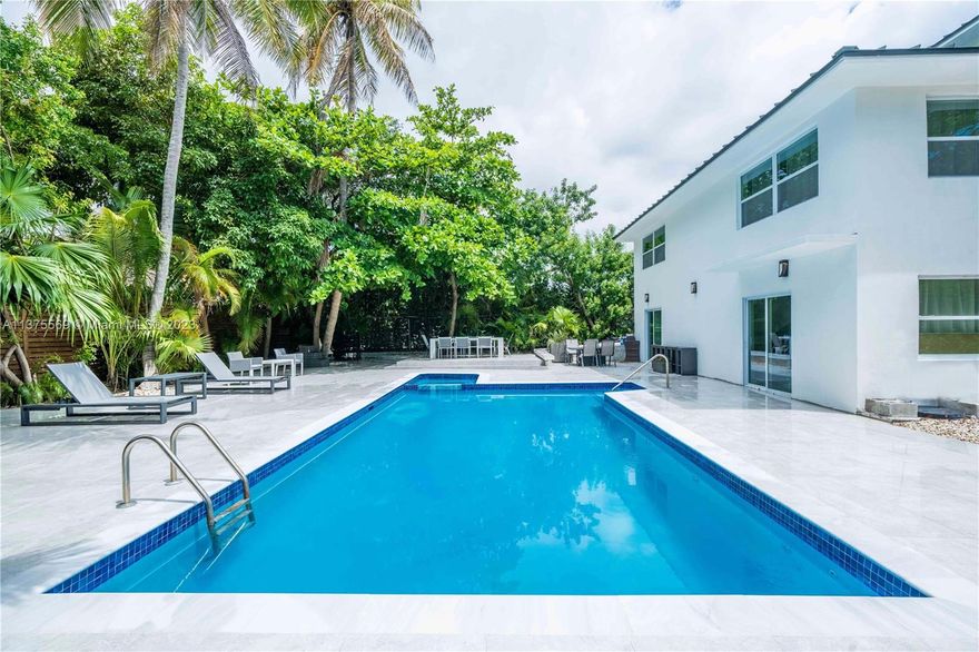 Exclusive Golden Beach home with  EXTRA LARGE LOT and incredible potential.