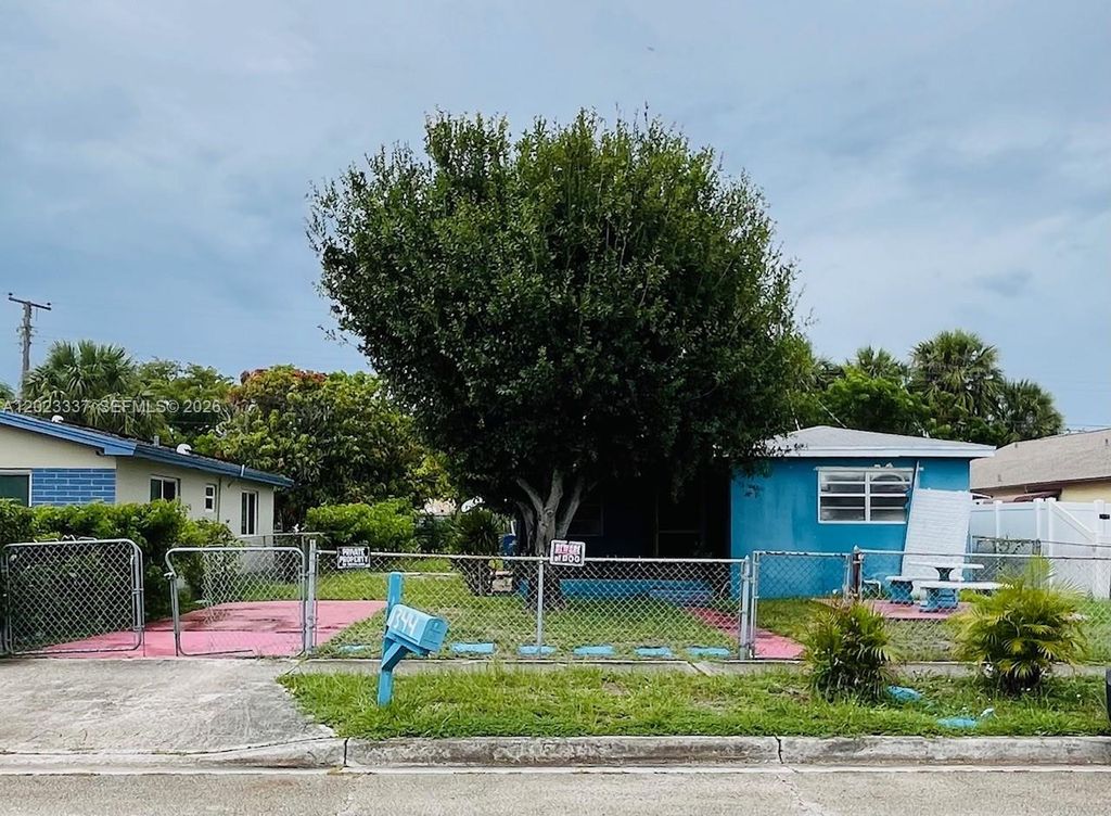 Photo of 1344 W 10th St, Riviera Beach, FL 33404 (MLS # A12023337)