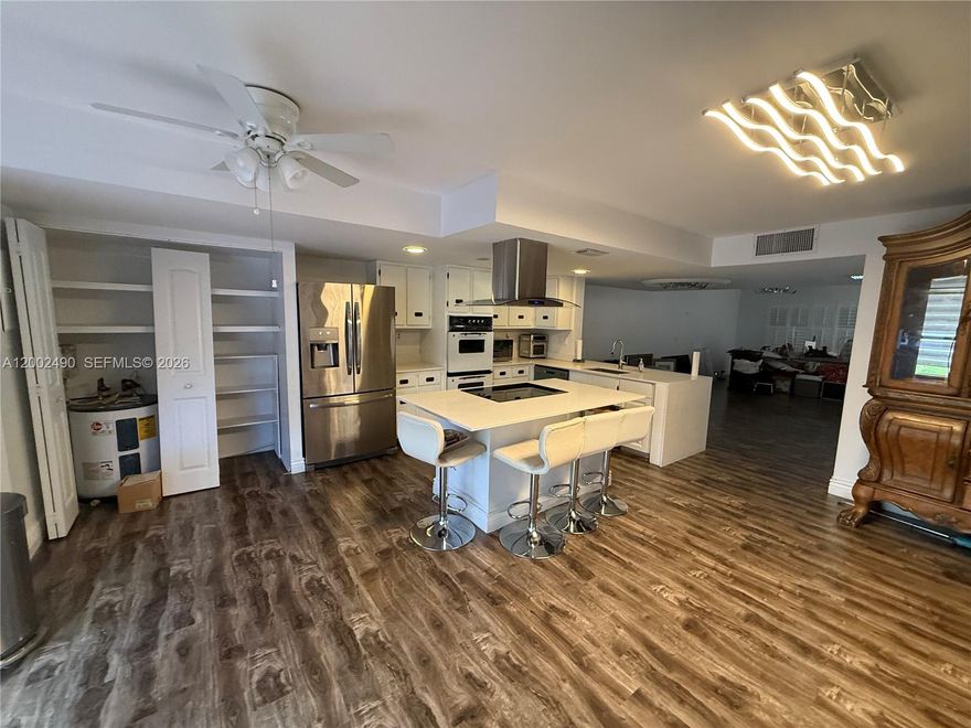 Impressive and expansive townhouse situated in the heart of Hallandale Beach. This property boasts generously sized bedrooms with walk-in closets, ample bathrooms, and storm shutters on all windows for enhanced security and peace of mind.