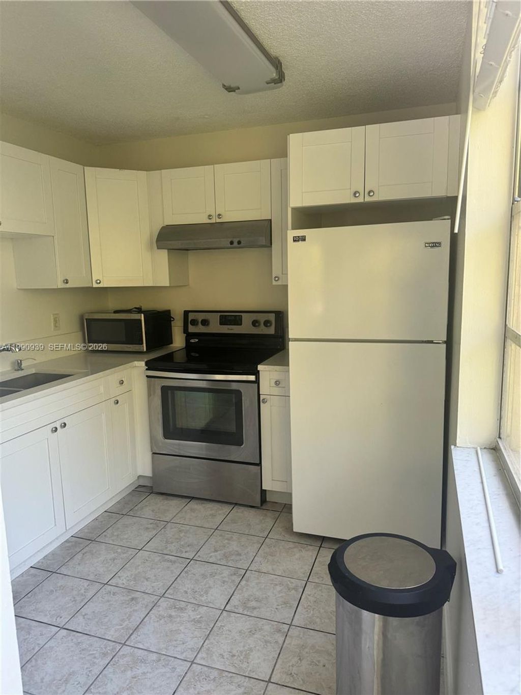 Photo of 9450 Live Oak Pl #305, Davie, FL 33324 (MLS # A11990939)