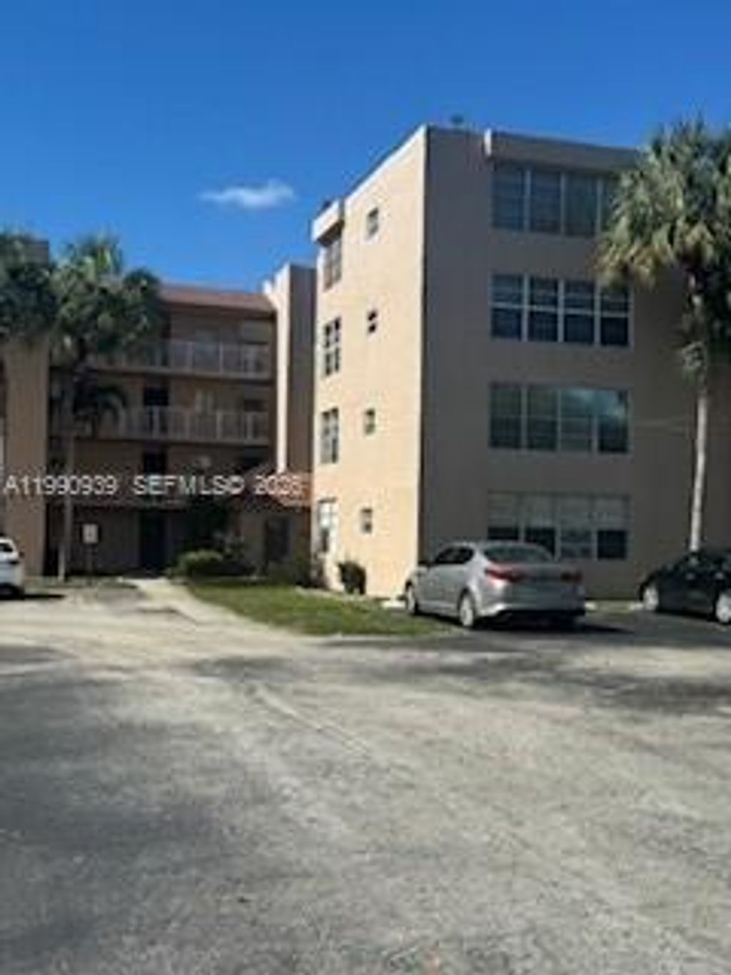 Photo of 9450 Live Oak Pl #305, Davie, FL 33324 (MLS # A11990939)