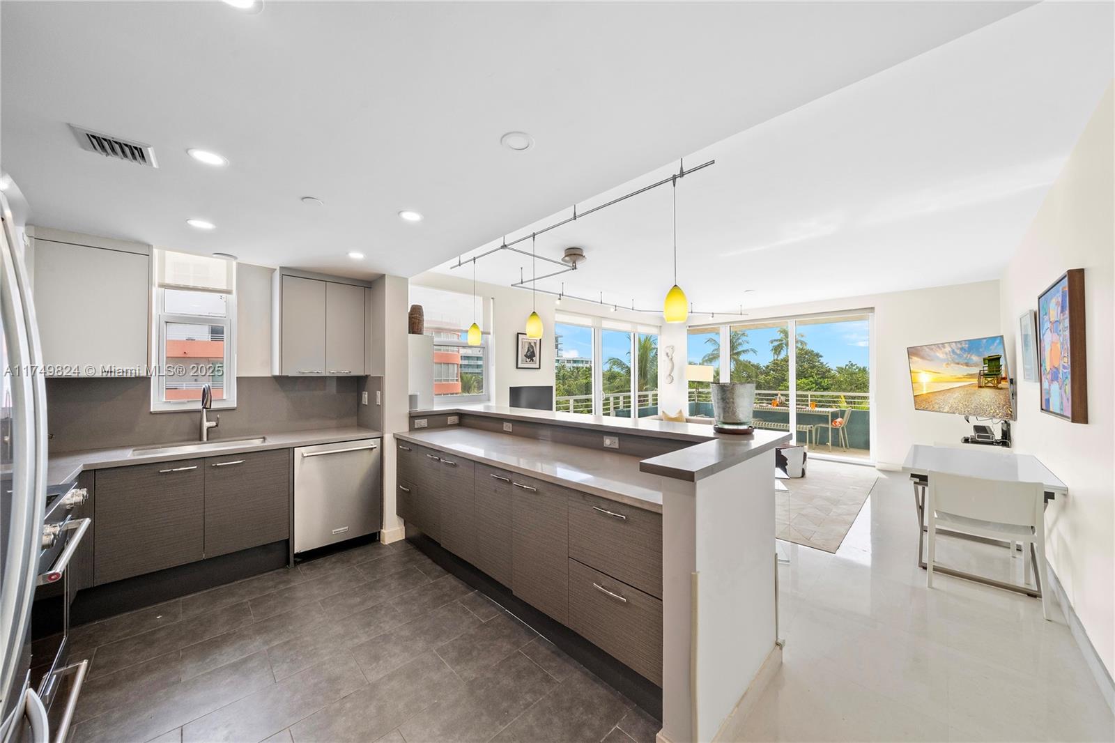 Live on iconic Ocean Drive, directly across from the beach & park! This chic, recently renovated corner 2BD/2BA residence offers an open layout, sun-filled living spaces, serene park & ocean views, a spacious balcony, & an eat-in European style kitchen w/ breakfast bar & S.S. appliances. $100,000+ renovation completed in 2022 that includes new impact windows, & new shower. For added convenience, enjoy a washer/dryer in unit, & 1 covered parking space included! This boutique, 20-unit building boasts a new roof, & lux amenities including a heated pool w/ ocean views, spa, gym, & secure lobby. Owner Paid All Assessments!