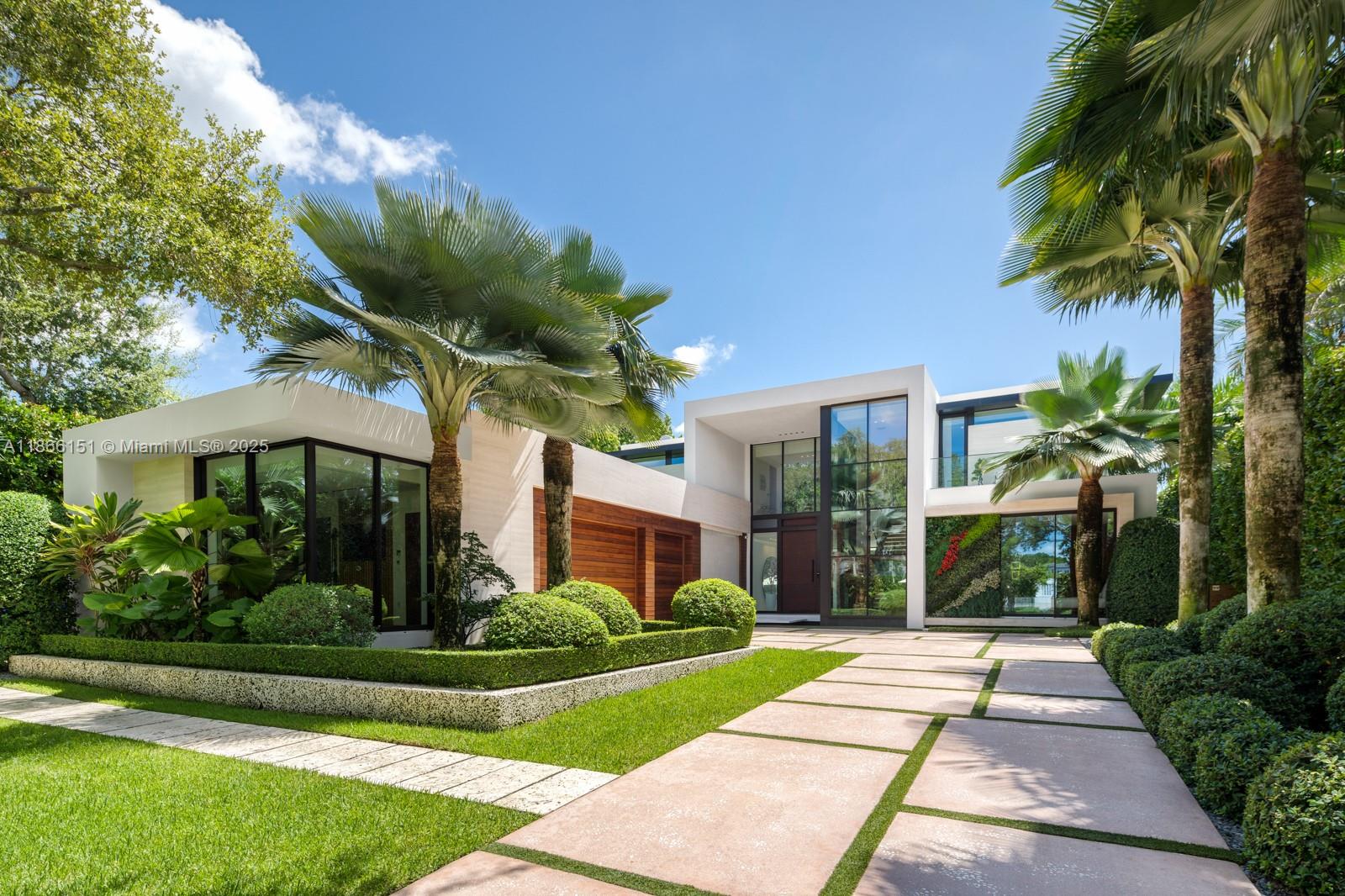 Turn-key modern masterpiece with unparalleled privacy in guard-gated Bay Point Estates. Just completed with over 6000SF of meticulously designed interiors. 3-beds/4-full bath/3-half-bath home features expansive flex living and entertaining spaces with the finest bespoke details and custom millwork throughout. Offering first-class amenities including a fitness studio, den with custom built-in-bar, open-concept kitchen, an infinity-edge saltwater pool, outdoor cabana bath/built-in BBQ. The upper floor= the ultimate primary suite complete with spa-inspired bathroom, lounge room, dual oversized walk-in closets, and private outdoor terrace. Savant home automation, a climate-controlled three-car garage, elevator, whole-home generator, koi pond and illuminated fountains redefine luxury living!
