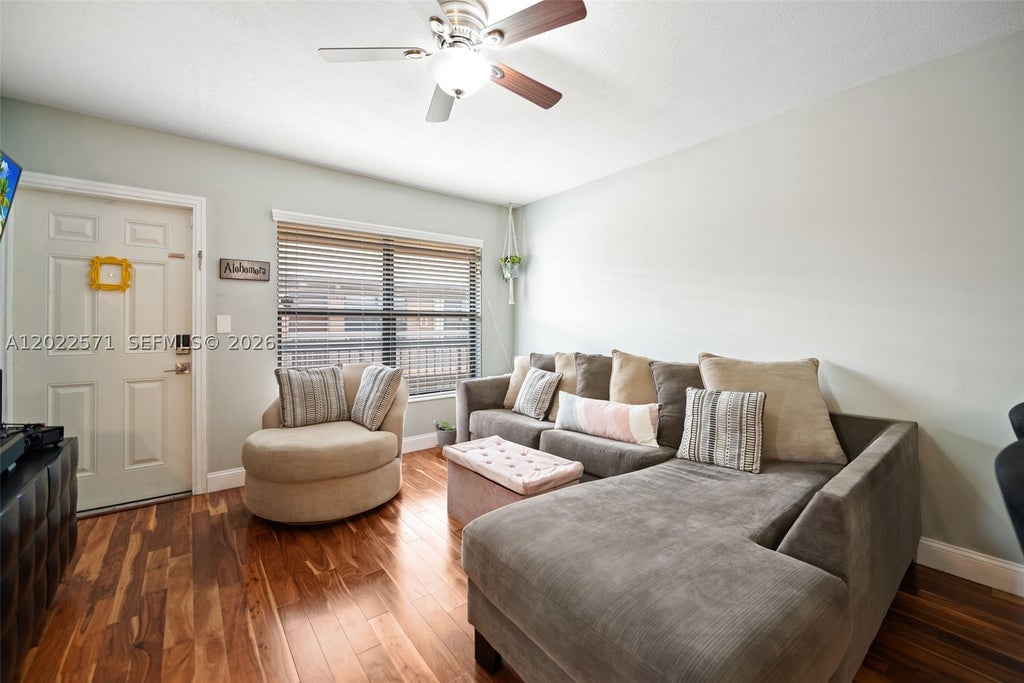 Photo of 10049 Winding Lake Rd #202, Sunrise, FL 33351 (MLS # A12022571)
