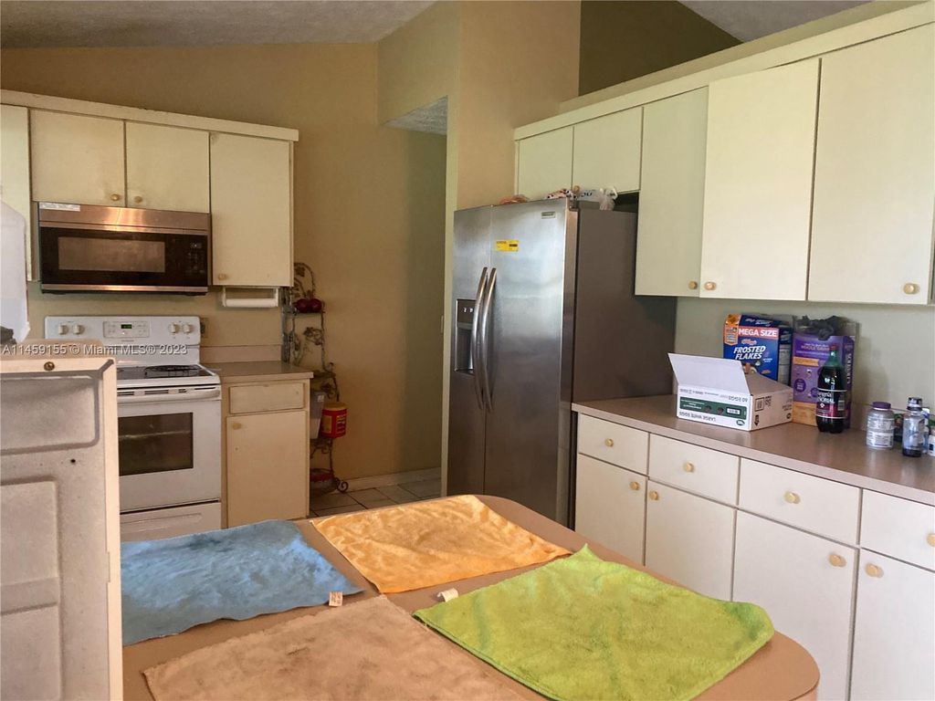 Photo of 1601 SE Nancy Ln, Port Saint Lucie, FL 34983 (MLS # A11459155)